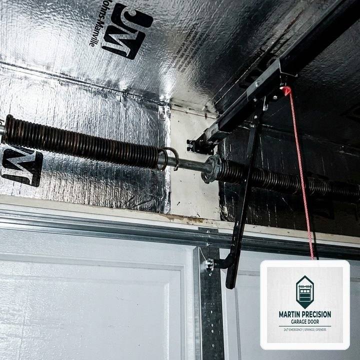 What to Do When Your Garage Door Jumps Off Track in Holbrook, MA
